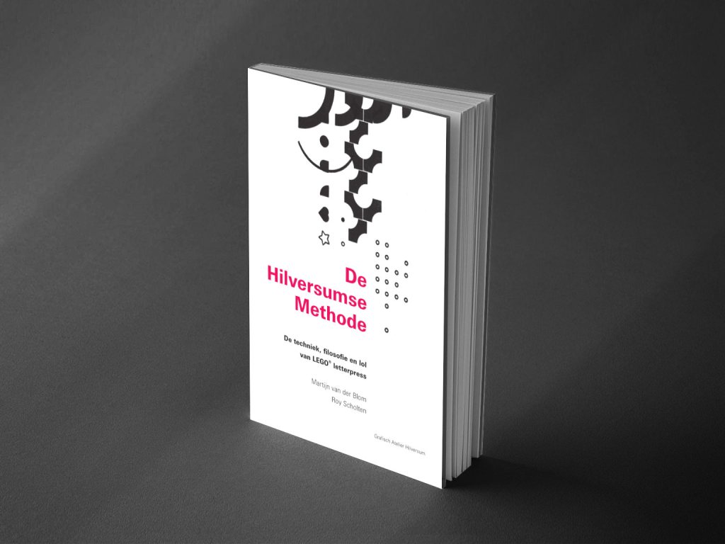 Een staand boek met de titel De Hilversumse Methode.